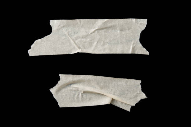 istock adhesive paper , masking tape isolated on black background 1500052723