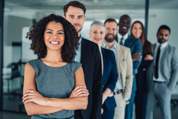istock Confident businesswoman and her team. 1500054531