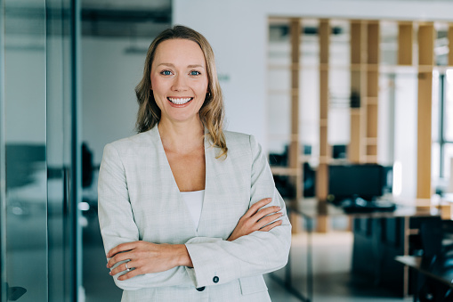 Close up portrait of a professional business woman smiling outdoor