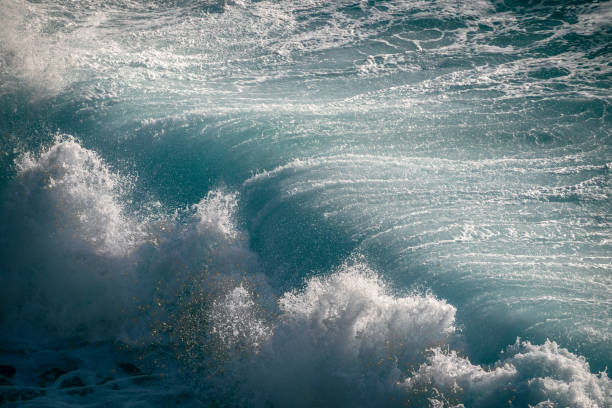istock Crashing waves on rocks landscape nature view 1500056277