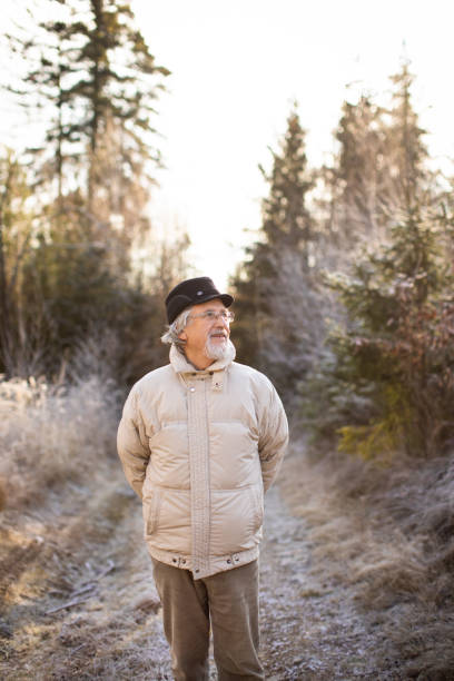 istock Happy senior man walking outside. 1500057139