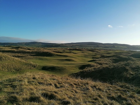 An aerial view of Fairmont St Andrews Torrance Course golf course, located in Scotland.