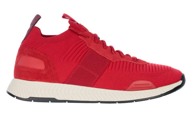istock Trendy sport shoe in red, white background, packshot. 1500060816