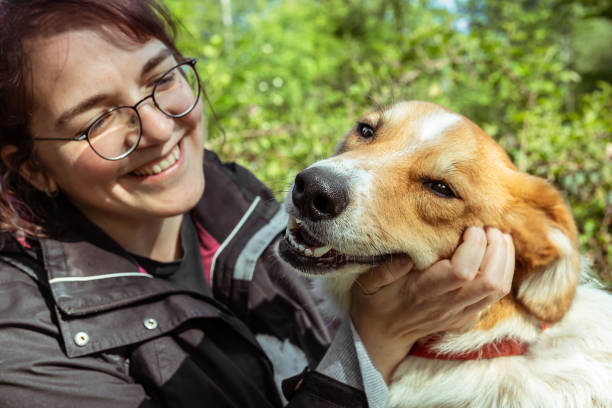 istock Young woman with her pet dog 1500062596