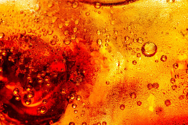 istock Cola and Ice, food background, Cola close-up, design element. Beer. Macro bubbles, ice, bubbles, background, ice cubes, abstract background. 1500071688
