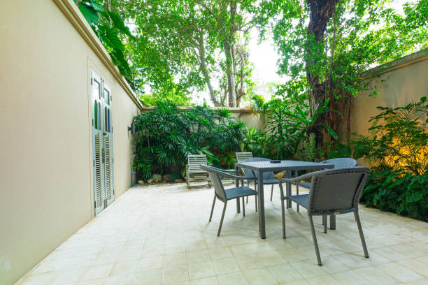 istock backyard garden table,Beautiful backyard with barbeque area and dining table 1500072101