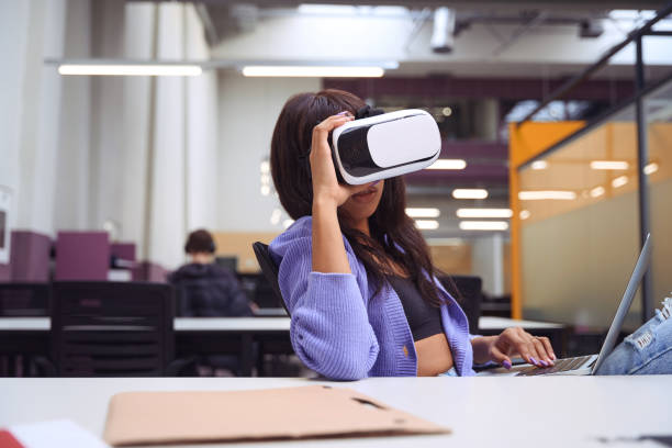istock Young woman in virtual reality headset indoors 1500074049