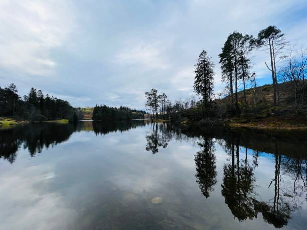 istock Reflections on a lake in the Lake District 1500074421