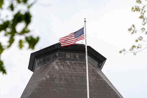 Ottawa, Canada - May 19, 2023: American flag on Embassy of the United States of America in Ottawa, Canada.