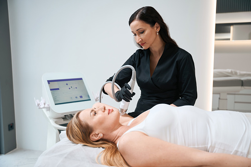Shoulder Rf Young Female Performs Effective Rf Lifting Procedure On Shoulder Area ...