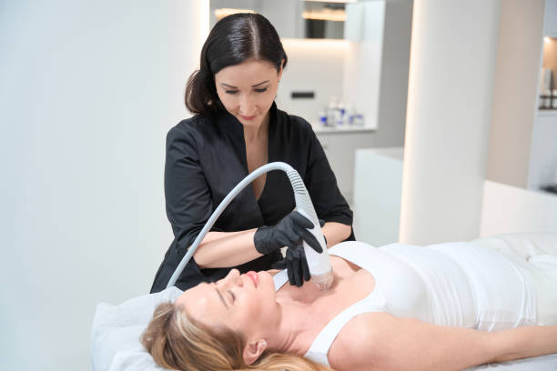 istock Blonde lies on a cosmetology couch during RF lifting procedure 1500080713