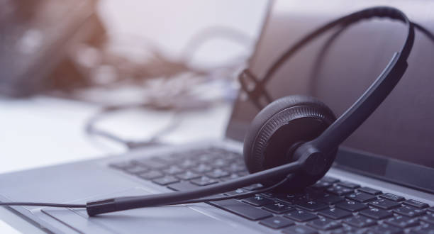 istock close up black headset with microphone on keyboard laptop in operation room to communicate with vendor or client for call center and hotline service concept 1500083481