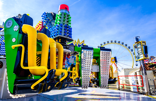 Munich, Germany - May 7: typical fairground rides and decoration at the annual spring festival (Frühlingsfest) in Munich on May 7, 2023