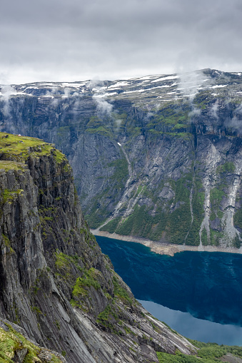 Amazing cliff over the Ringedalsvatnet lake in Trolltunga mounatin area, Norway