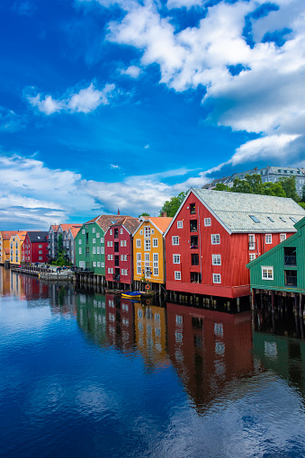 Beautiful view of the colorful wooden buildings of Trondheim Canal, Norway