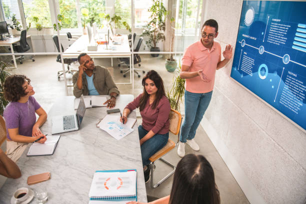 istock Inspiring Business Presentation: Diverse Team's Engagement 1500092597
