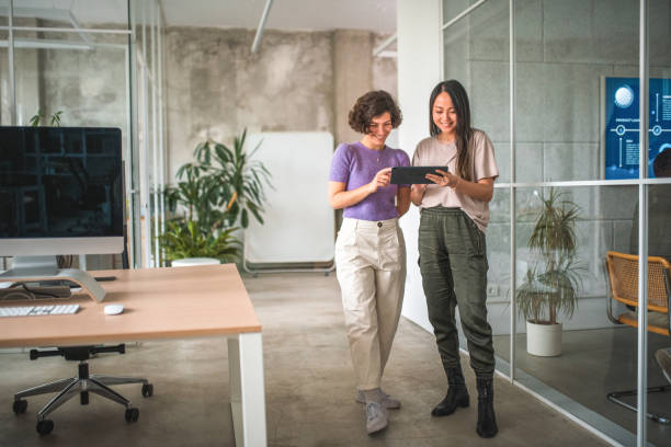istock Multicultural Digital Marketing Female Colleagues Analyzing Market Trends 1500092633