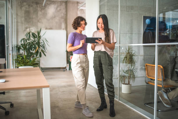 istock Multicultural Digital Marketing Female Colleagues Analyzing Market Trends 1500092640
