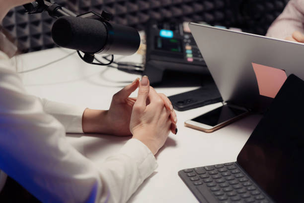 istock Crop woman clasping hands during podcast recording 1500096665