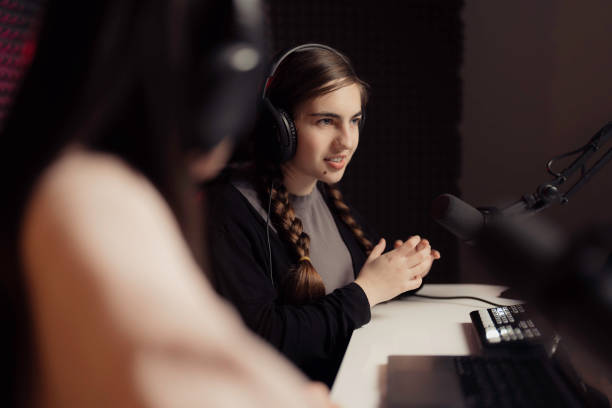 istock Young woman during podcast in studio 1500096739