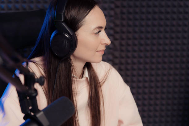 istock Young woman during podcast in studio 1500096756