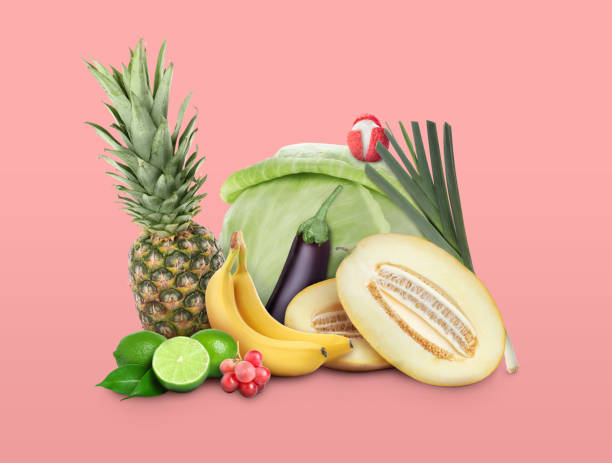 istock Fresh fruits and vegetables on pink background 1500098109