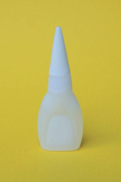 istock one small white closed plastic tube with glue 1500098712