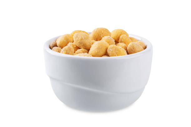 istock Cheese peanuts in a bowl on a white isolated background 1500101706