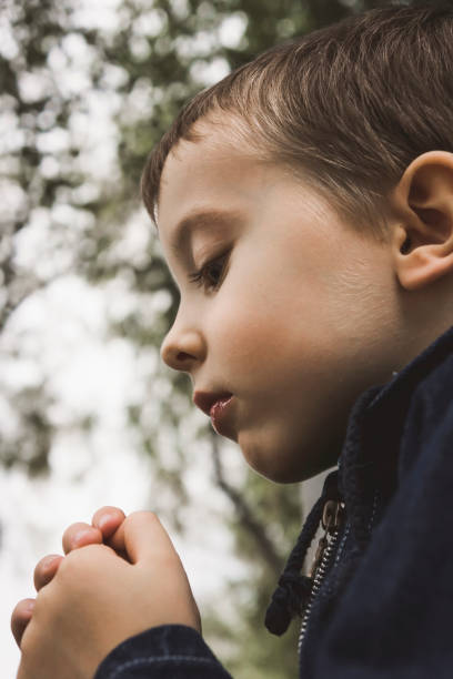 istock sad boy outdoors 1500102522