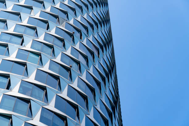 istock Looking up at modern office buildings 1500102529
