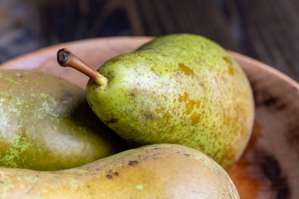 istock Ripe green pears on the table 1500109639