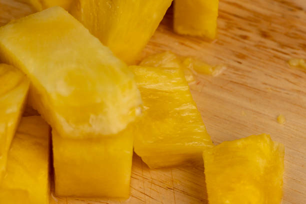 istock Sliced delicious ripe pineapple yellow, close up 1500109719