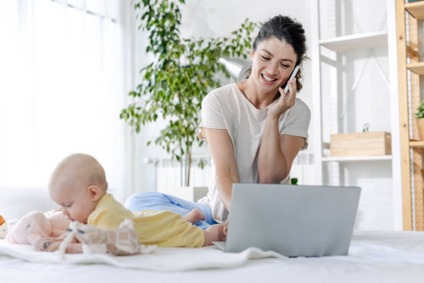 istock Portrait of a young mother multi-tasking 1500114289