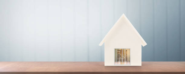 istock Wood home model isolated on white background. concept 1500130100