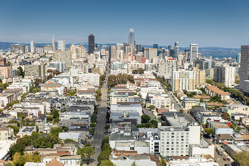 Aerial view of San Francisco, California on a sunny summer day from across the Lower Haight towards the Tenderloin and the financial district.