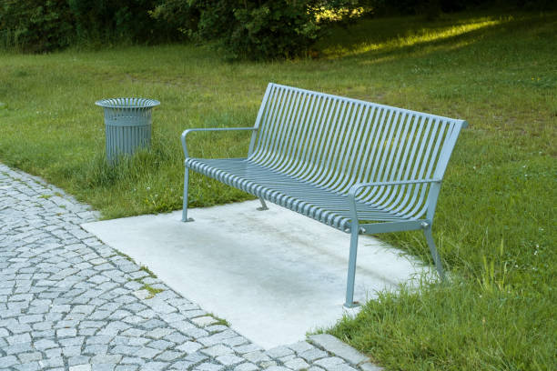 istock Modern Metal bench in the city park. 1500135440