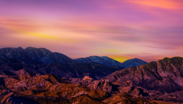 istock Side View on highway with mountain at sunset in Nevada, USA 1500150928