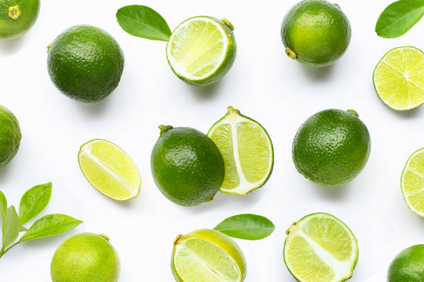 istock Limes with leaves isolated on white background. 1500168057