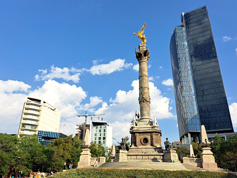 Mexico City, Mexico - Apr 24 2023: The Angel of Independence Monument is an honorary column found on Paseo de la Reforma avenue, a cultural icon