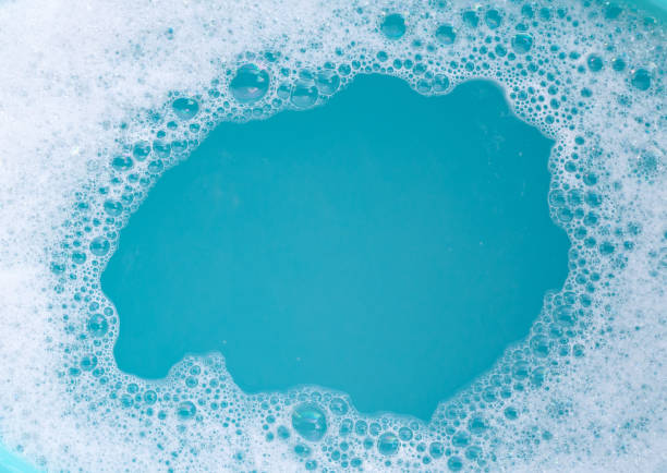 istock Detergent foam bubble on wate. Blue background, Soap sud 1500180724