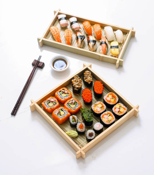 istock Set of sushi and rolls with a salmon. 1500180758