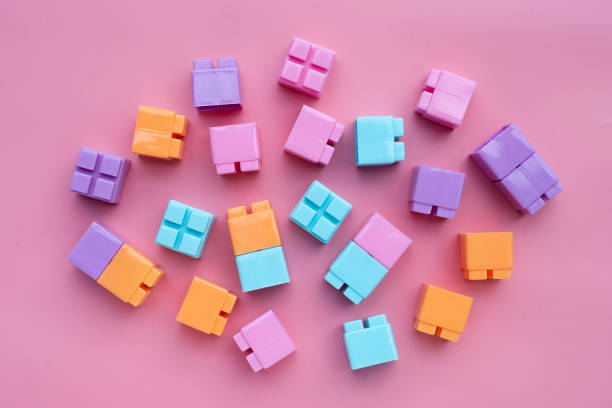 istock Plastic building blocks isolated on pink background. Top view 1500180827