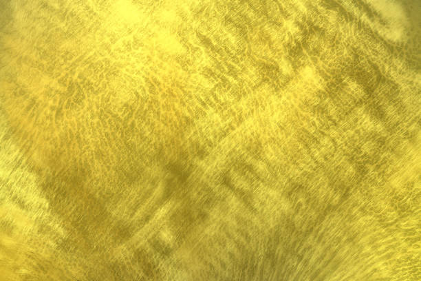 光沢のある金色の金属壁テクスチャ背景、金色のパターン - platinum card ストックフォトと画像