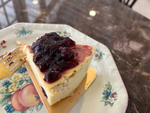istock Cheese cake with blueberry toppings served on a plate 1500189105