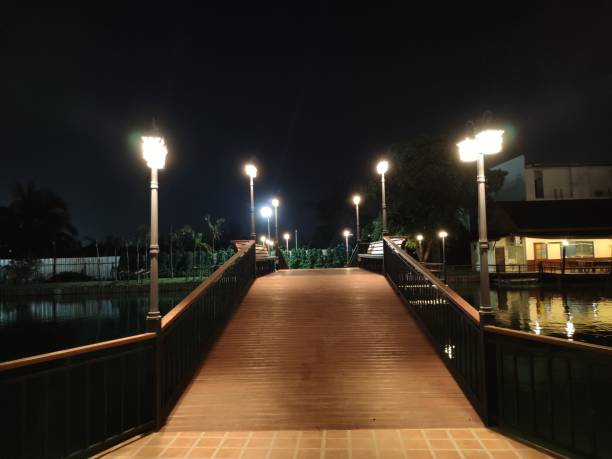 Romantic atmosphere at night At the wooden bridge