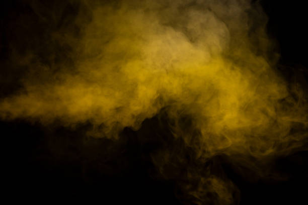 istock Yellow steam on a black background. 1500211151