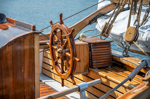 detail of a sailing boat - here steering wheel