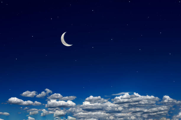 istock Crescent moon rising over the cloudscape 1500218831