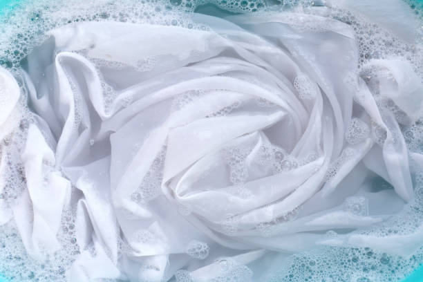 istock Soak a cloth before washing, white cloth 1500222745