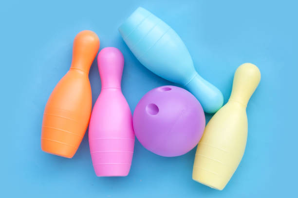 istock Colorful plastic bowling toy on blue background. 1500223675